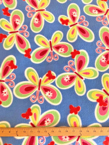 Lilly Craft Butterflies on Blue Fleece Print Fabric is 58-60" Wide and Sold by the Yard