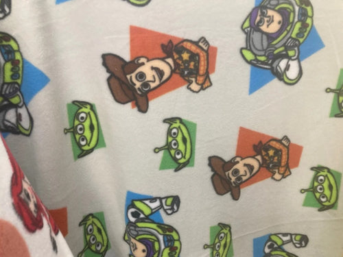 Lilly Craft Woody and Buzz Fleece Fabric is Cut and Sold by the Yard 100% Polyester and is 58” / 60” Wide